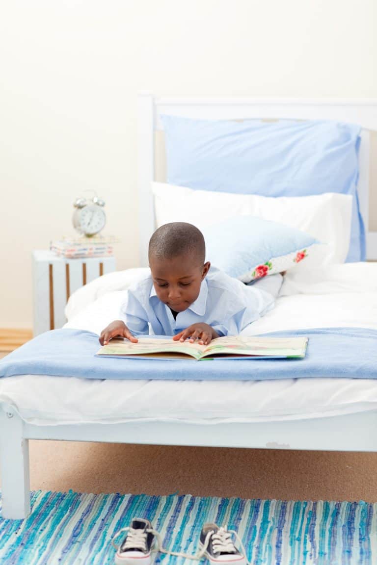 Little boy reading a book