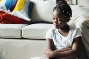 Black girl with sadness emotion